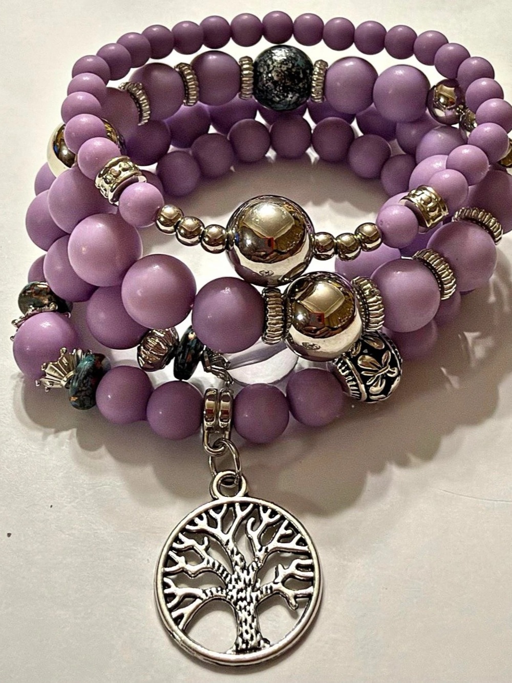 Purple Beaded Bracelet Stack with Tree Pendant